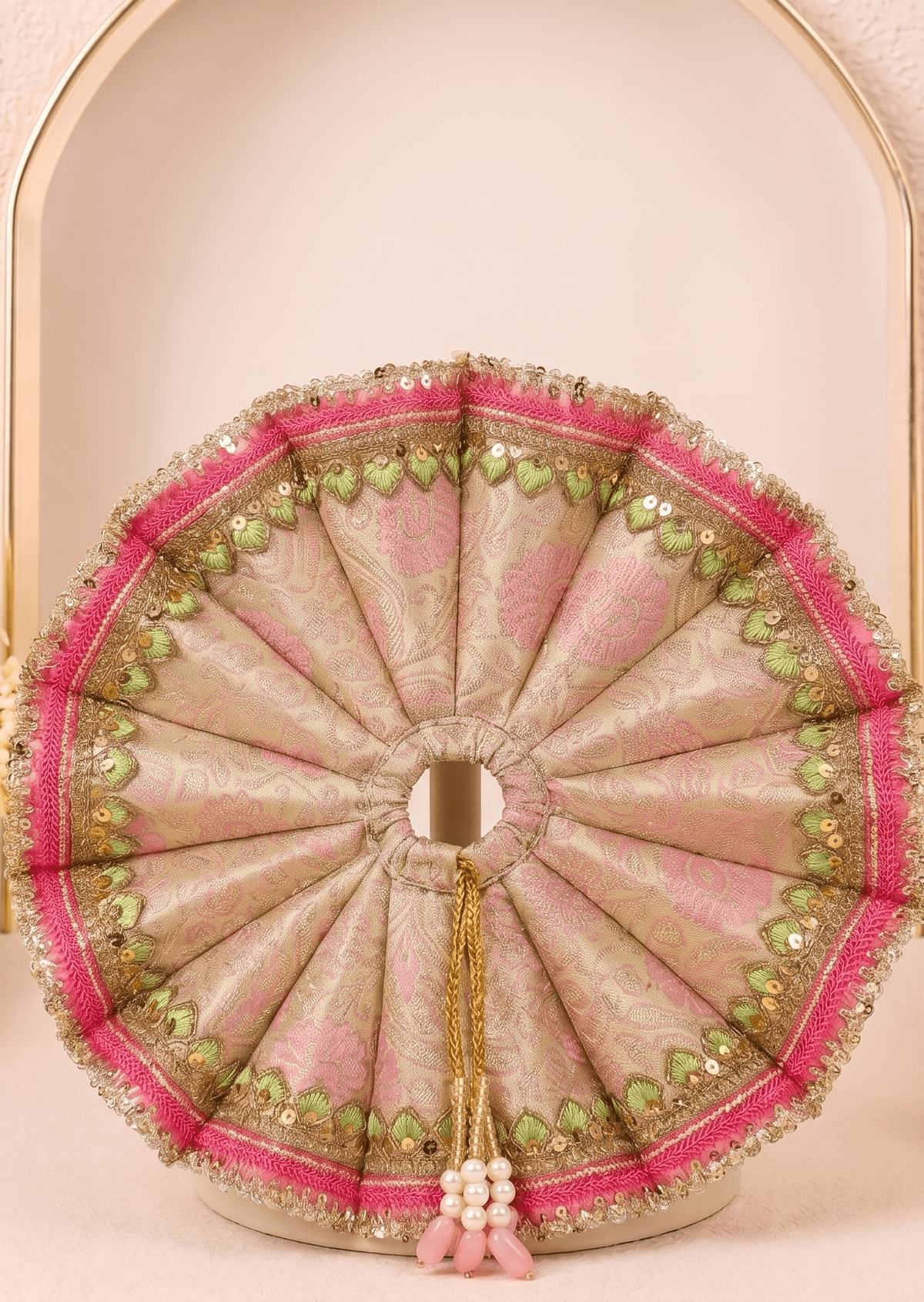 Back view of Vrinda Madhuri Set premium handmade Laddu Gopal designer dress featuring pastel pink brocade fabric, gold zari border and circular flare