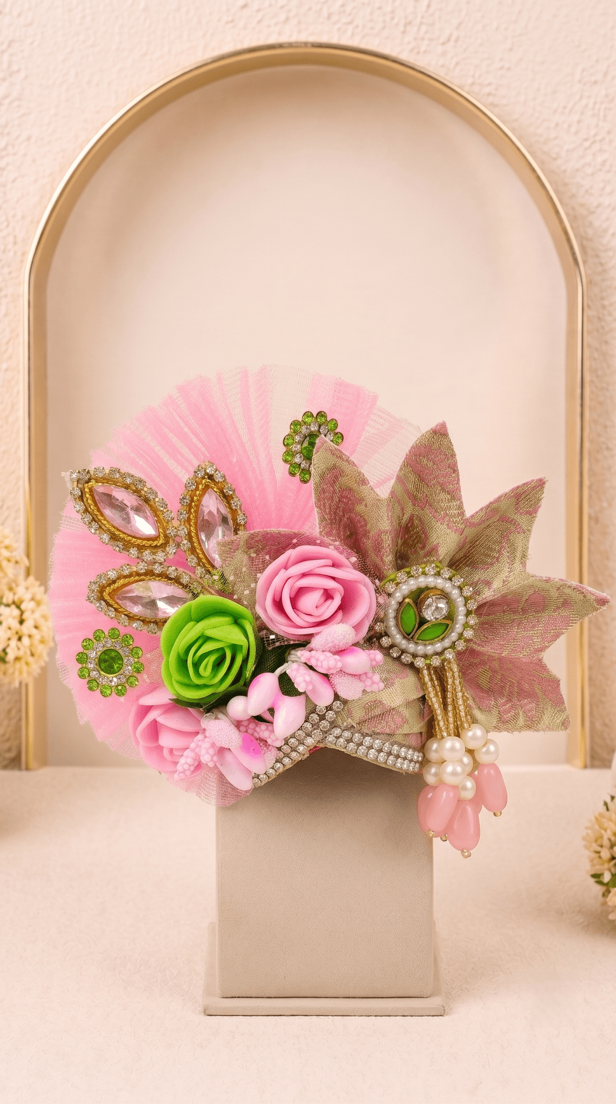 Designer floral mukut from Vrinda Madhuri Set featuring pastel pink flowers, pearl embellishments, green accents and handcrafted crown for Laddu Gopal Ji