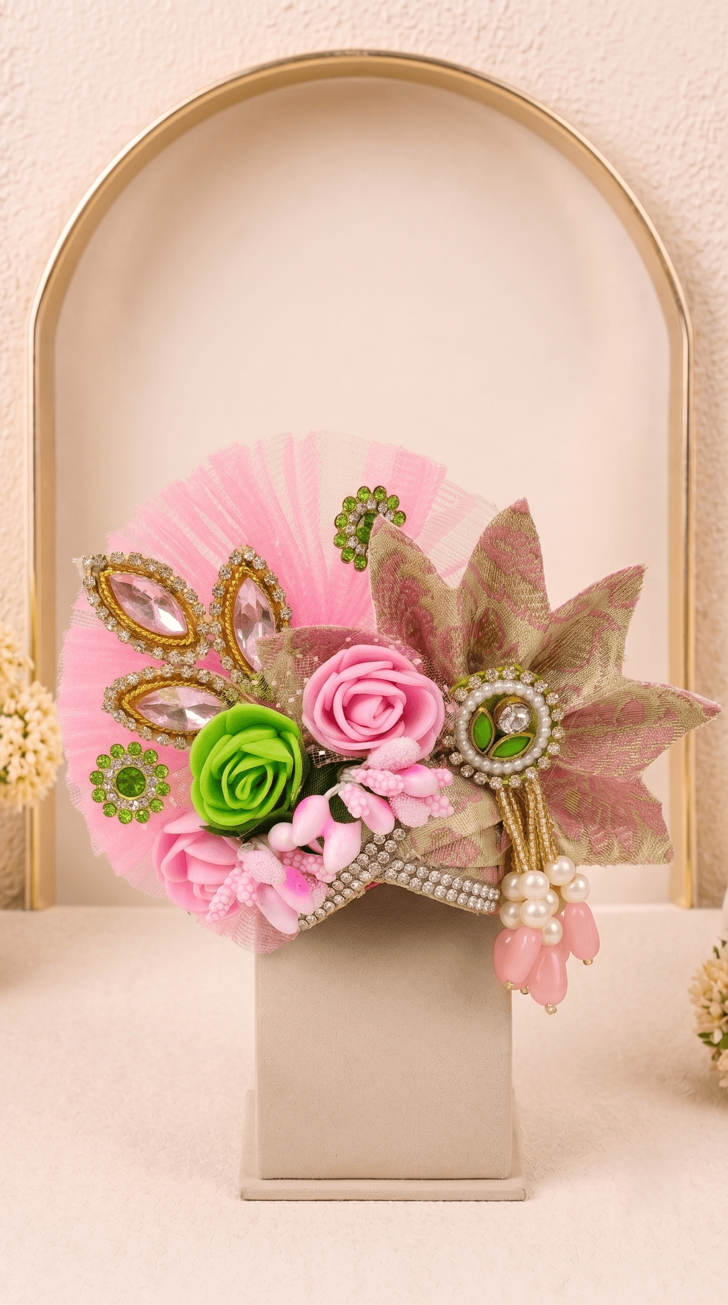 Designer floral mukut from Vrinda Madhuri Set featuring pastel pink flowers, pearl embellishments, green accents and handcrafted crown for Laddu Gopal Ji