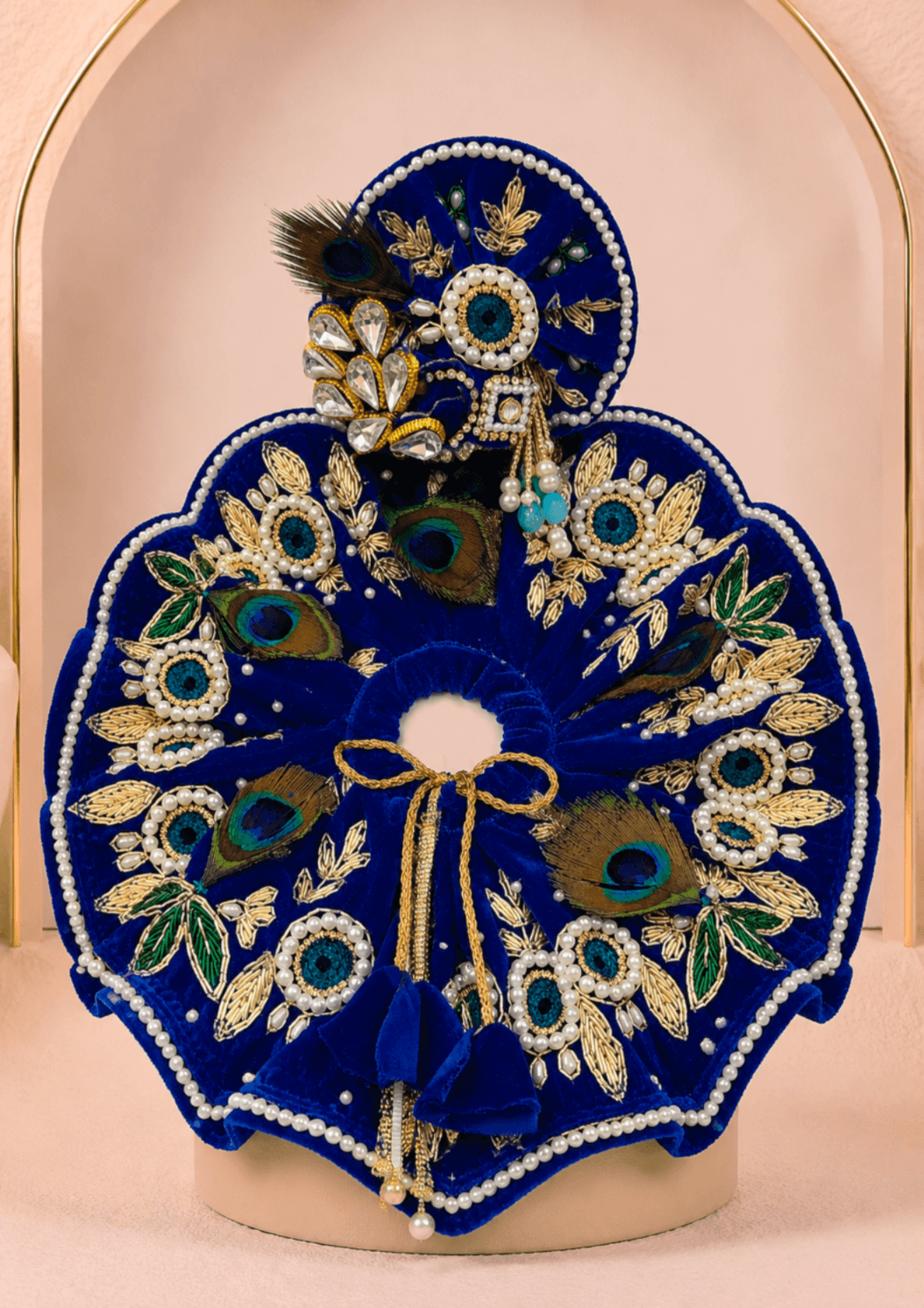 Neelambar Set circular Laddu Gopal designer dress with matching handcrafted mukut, royal blue fabric, golden embroidery, pearl detailing and peacock feathers